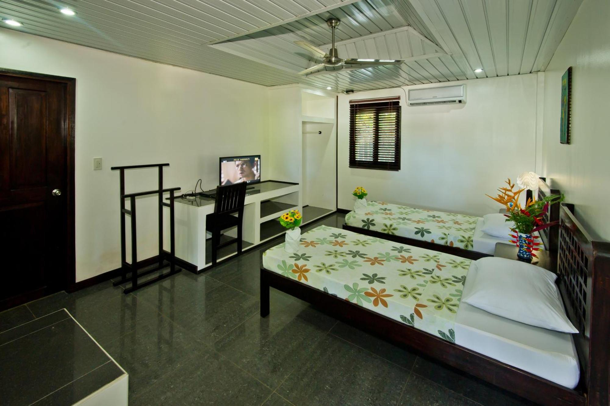 Balay Tuko Garden Inn Puerto Princesa Værelse billede
